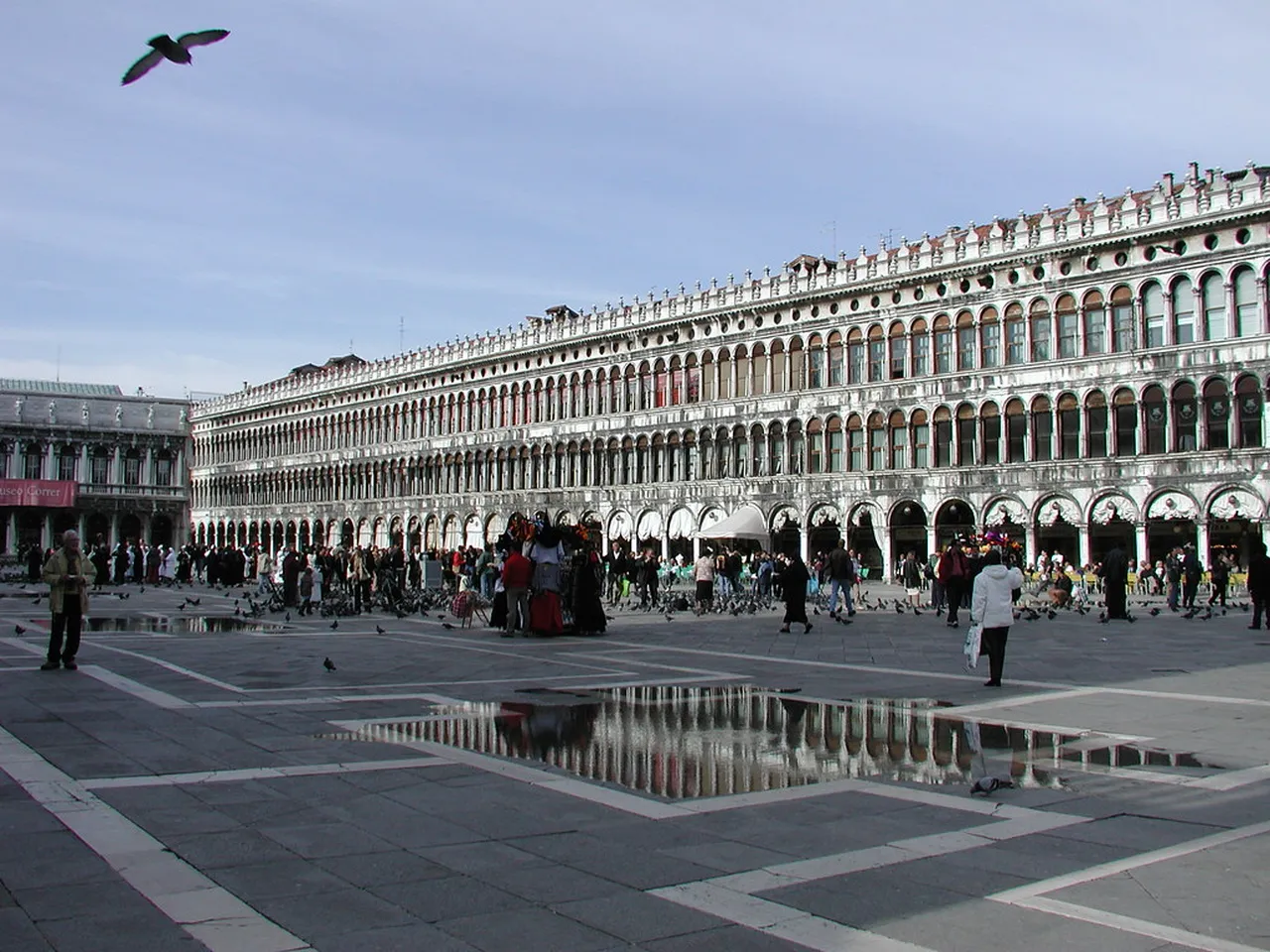 2. Gondola Ride Through the Grand Canal